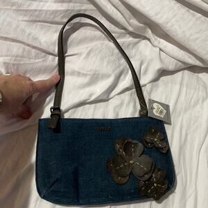 XOXO denim with 3D flowers in brow distressed leather like look NWT and perfect